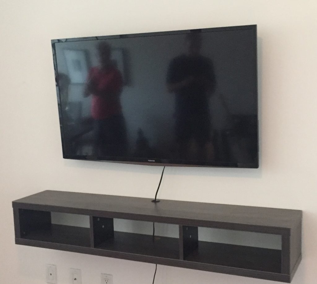 Wall mount TV and floating shelf